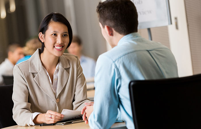 A man and a woman having a work meeting